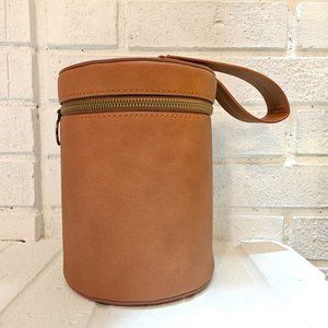 Minimalist Tan Leather Cylindrical Handbag with Brass Zipper Detail